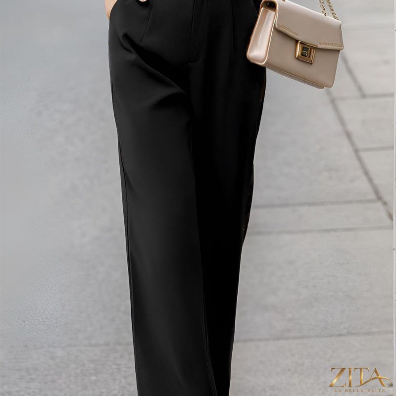 Elegant women's suit pants by Zita La Belle Elite featuring a tailored fit and practical pockets, suitable for professional or formal wear.