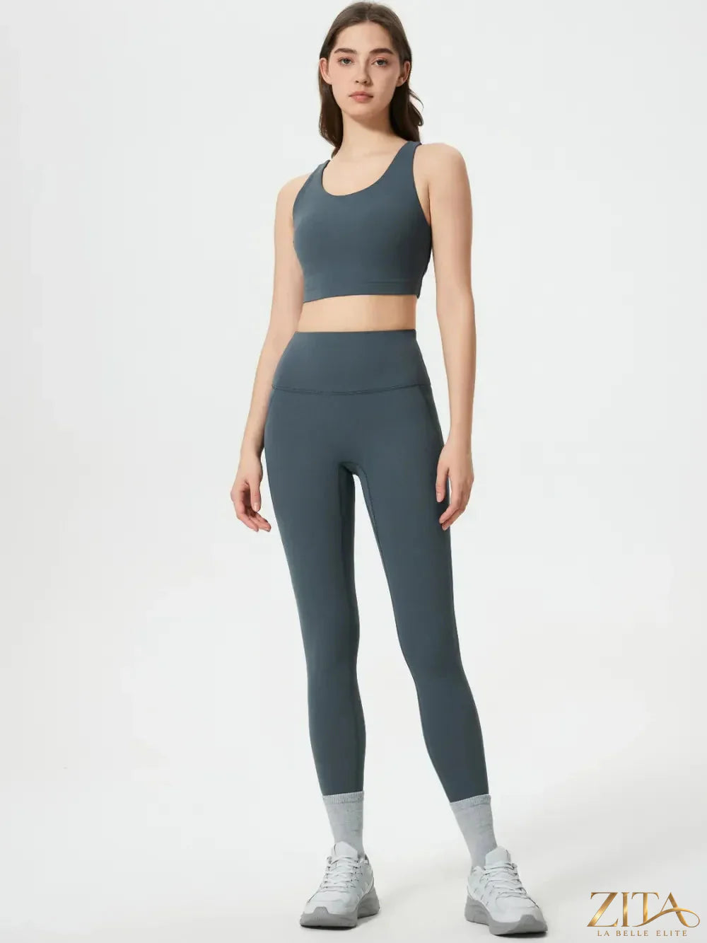 Millennia wide waistband active leggings by Trendsi, black stretch leggings with comfortable high-rise waist and sleek design.