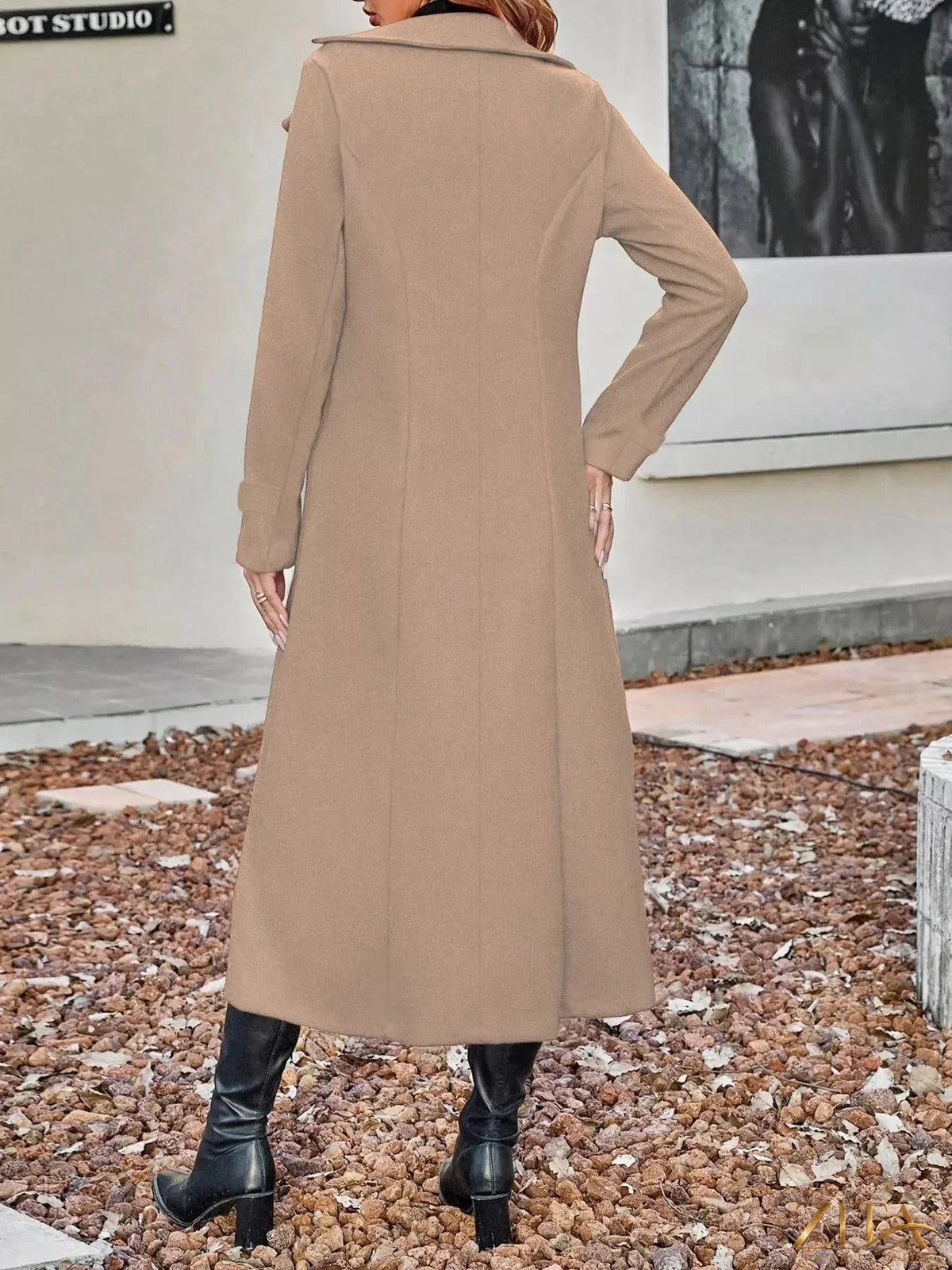 Zita La Belle Elite double-breasted longline coat in neutral fabric, featuring a tailored fit and classic lapel design.