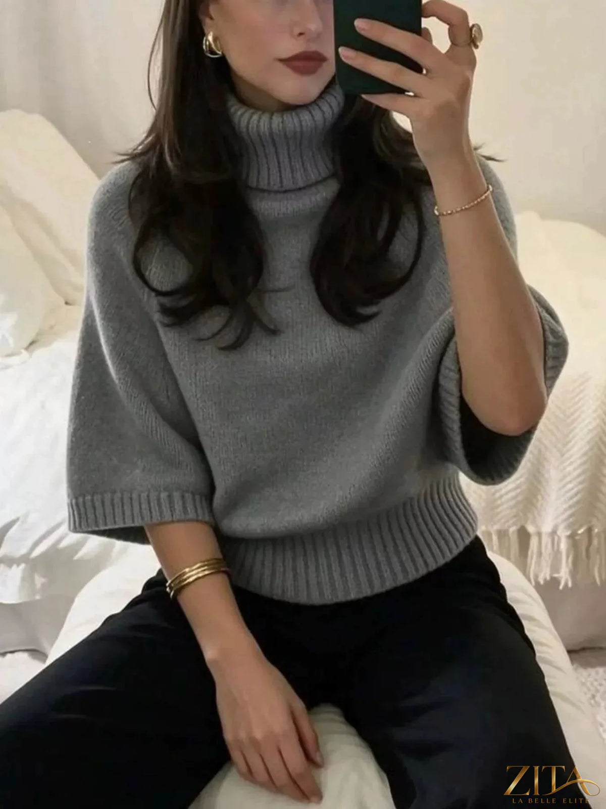 Beige turtleneck batwing sleeve sweater by Trendsi featuring a cozy, oversized fit and soft knit fabric.