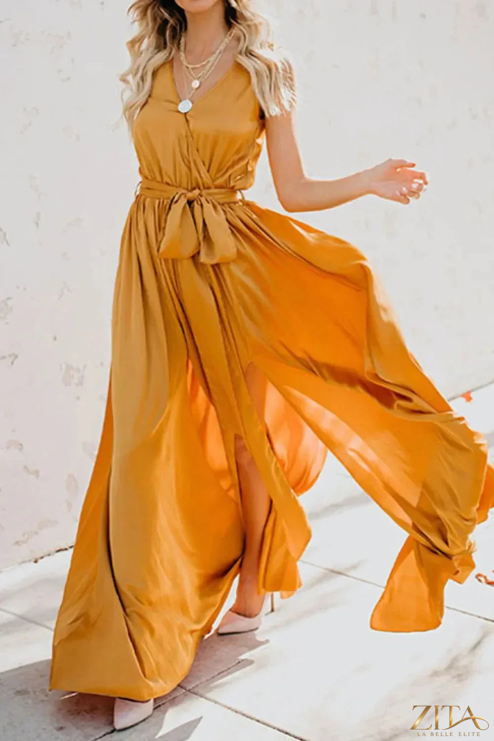 Zita La Belle Elite surplice tie waist maxi dress in flowing fabric, featuring a V-neck and elegant silhouette.