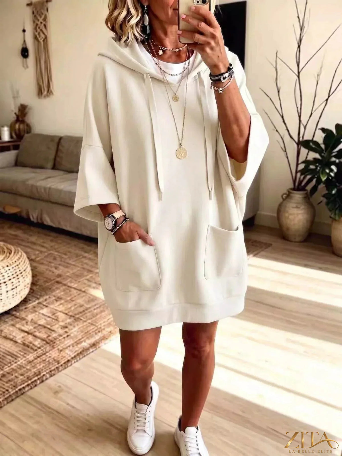 Plus size oversized drawstring hoodie with front pockets from Zita La Belle Elite, featuring a relaxed fit and cozy design.