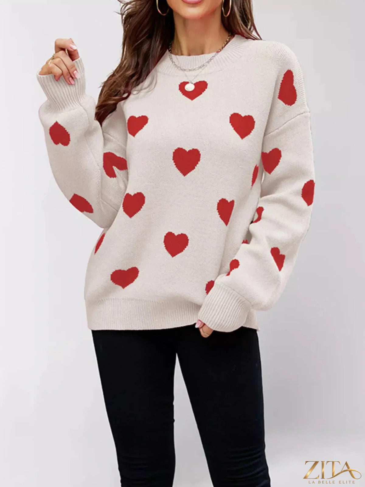 Heart-patterned dropped shoulder sweater by Zita La Belle Elite, featuring a cozy knit with romantic heart designs.
