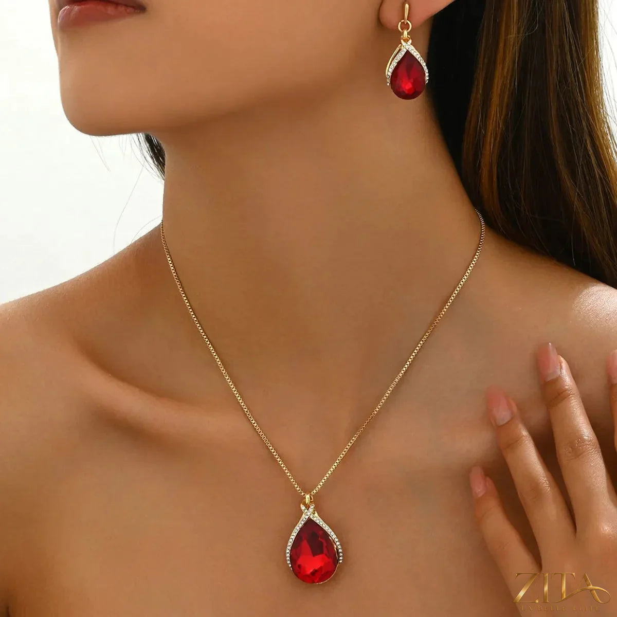 18K gold-plated rhinestone teardrop necklace and earrings jewelry set by Zita La Belle Elite, featuring sparkling teardrop designs.