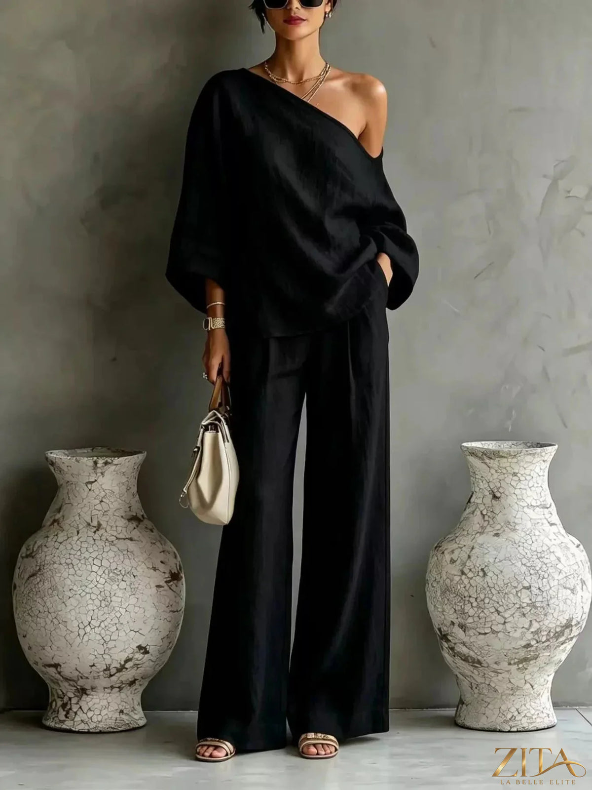 Zita La Belle Elite one-shoulder top and wide-leg pants set in stylish fabric, featuring a modern, elegant design.