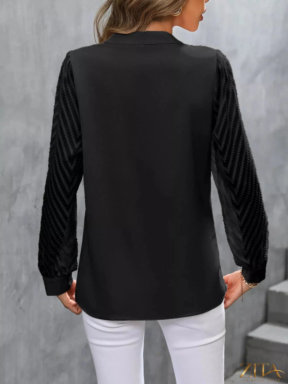 Zita La Belle Elite sheer sleeve v-neck blouse featuring lightweight, elegant fabric and stylish design, displayed on a hanger.