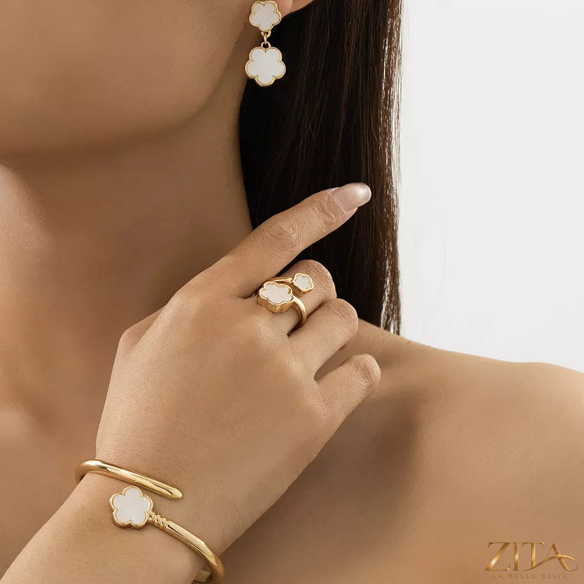 18K gold-plated flower jewelry set by Zita La Belle Elite featuring a necklace and earrings with floral design.