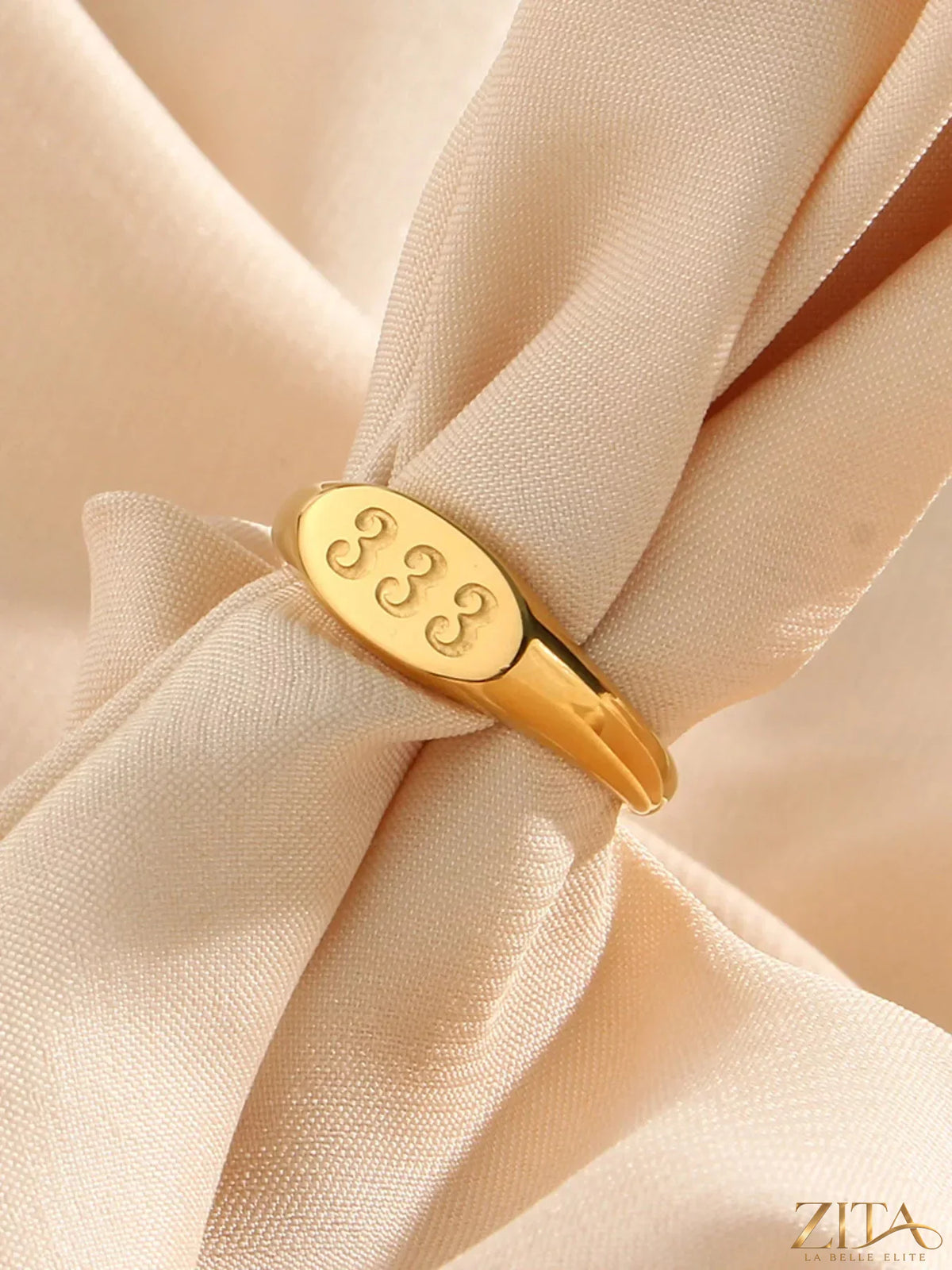 18K gold-plated 333 number signet ring by Zita La Belle Elite, featuring a smooth, polished surface and classic design.