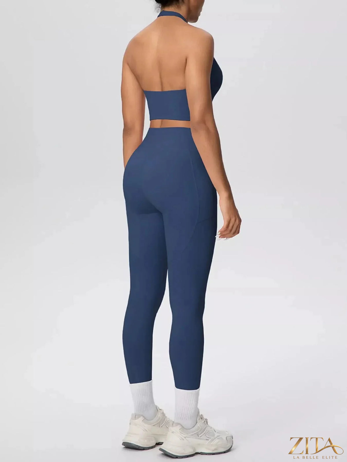 Zita La Belle Elite halter neck crop top and high-waisted leggings active set, black fabric, fitted athletic wear for women.