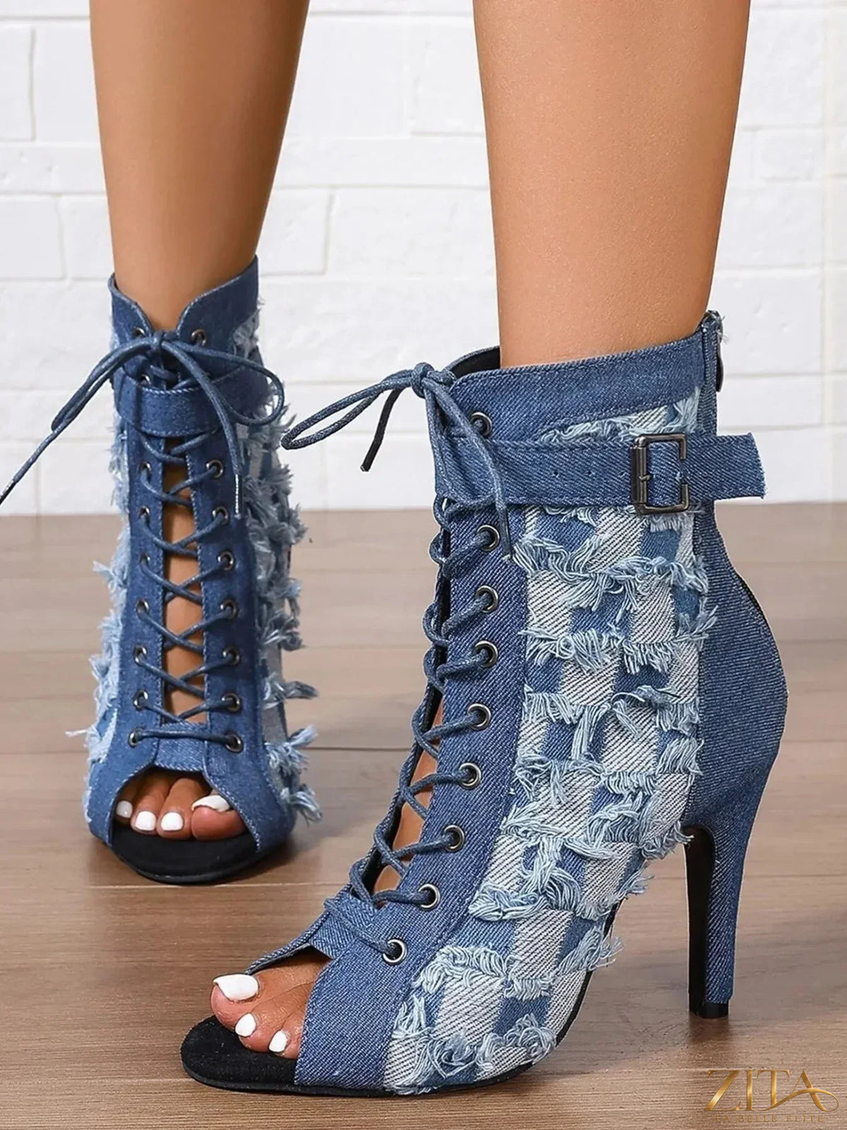 Distressed denim lace-up peep toe ankle boots by Zita La Belle Elite, featuring rugged style and open toe design.