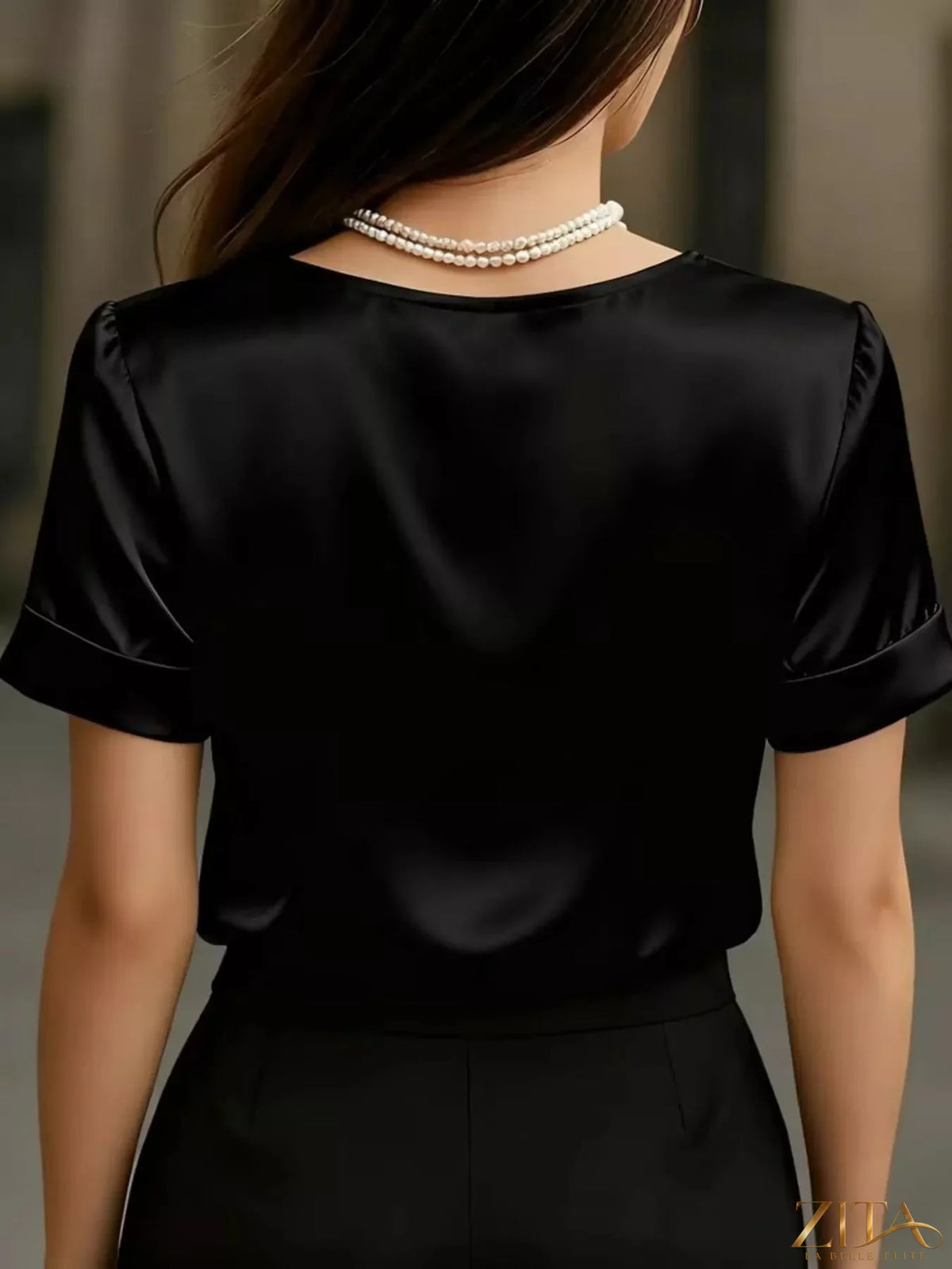 V-Neck short sleeve satin blouse by Zita La Belle Elite, shown in smooth, shiny fabric with a relaxed fit and elegant design.