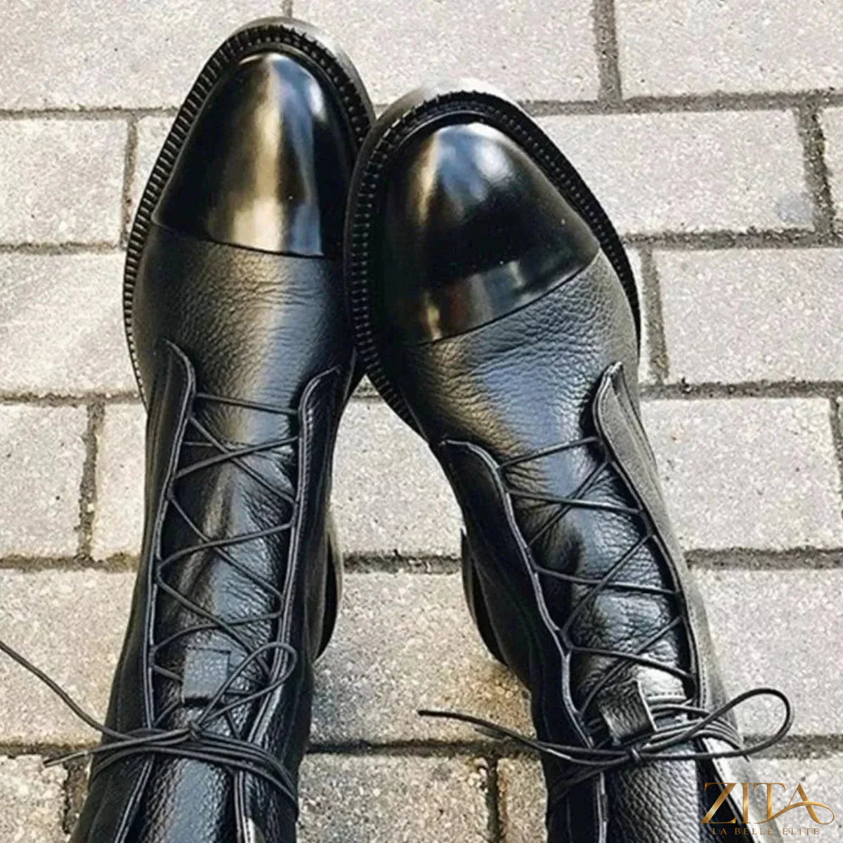 Black lace-up leather boots from Trendsi with sturdy soles and stylish design, perfect for casual or rugged outfits.
