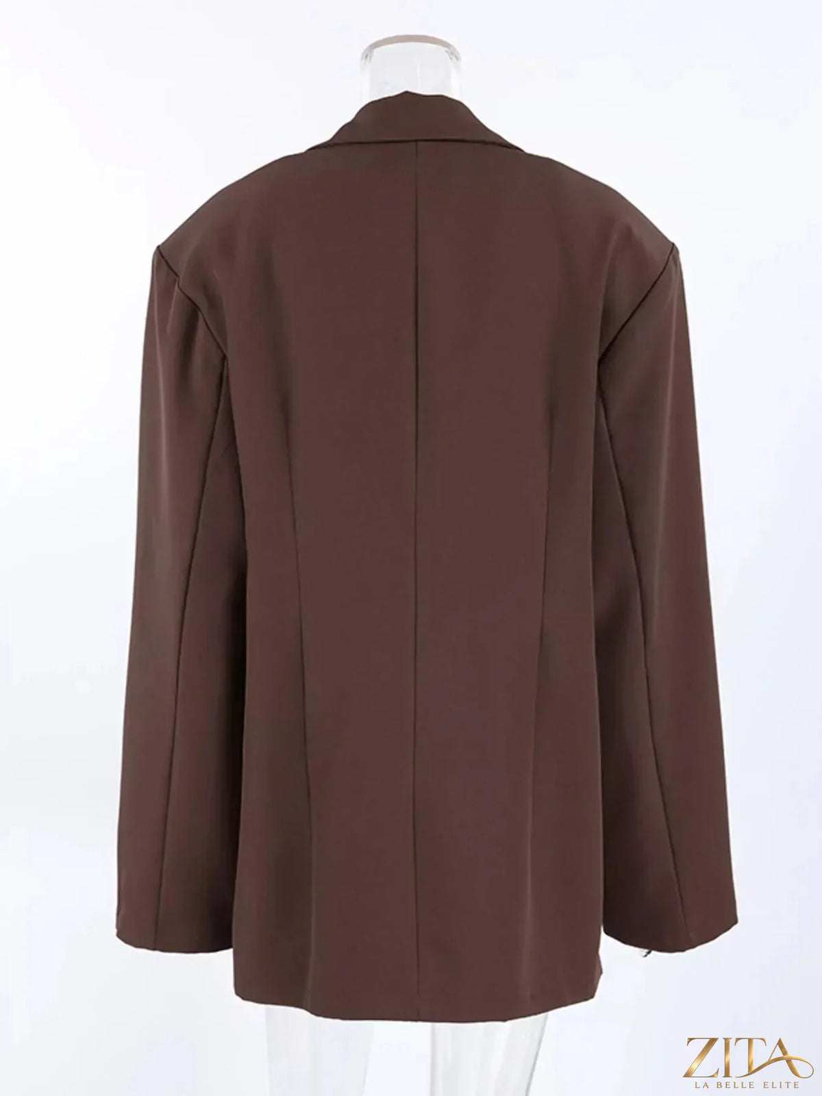 Black double-breasted blazer with lapel collar from Trendsi, shown on a hanger with front view.