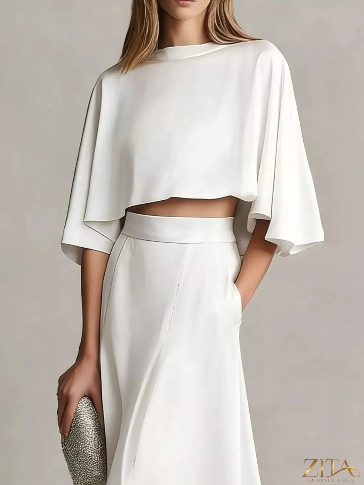 Plus size satin crop top and maxi skirt set by Zita La Belle Elite, featuring a stylish two-piece fashion ensemble.