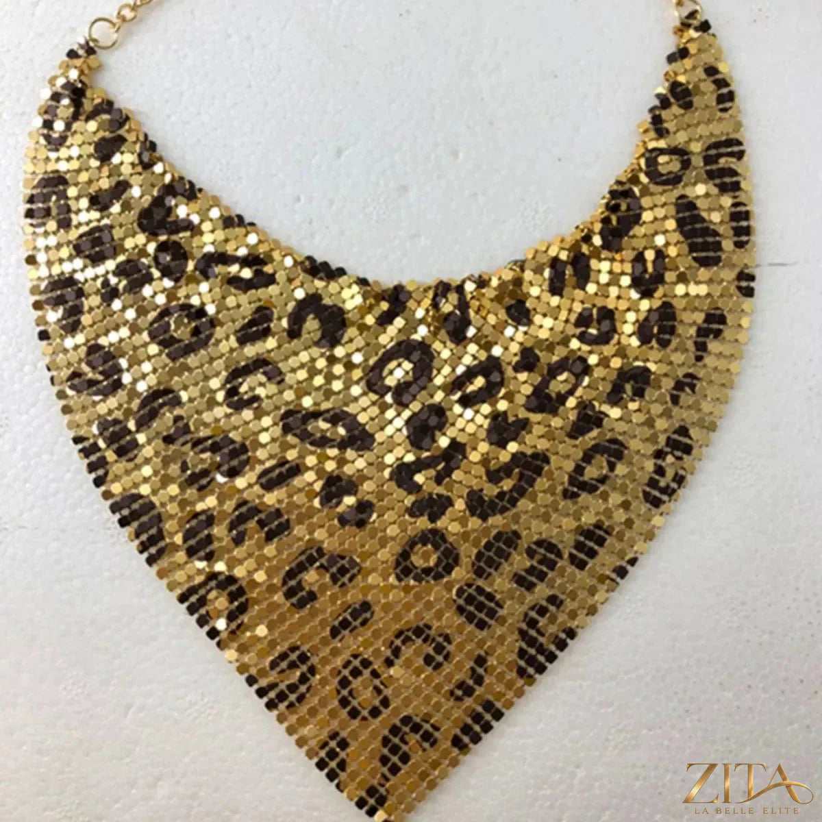 Leopard jewelry set with matching necklace and earrings featuring animal print design, crafted by Trendsi.