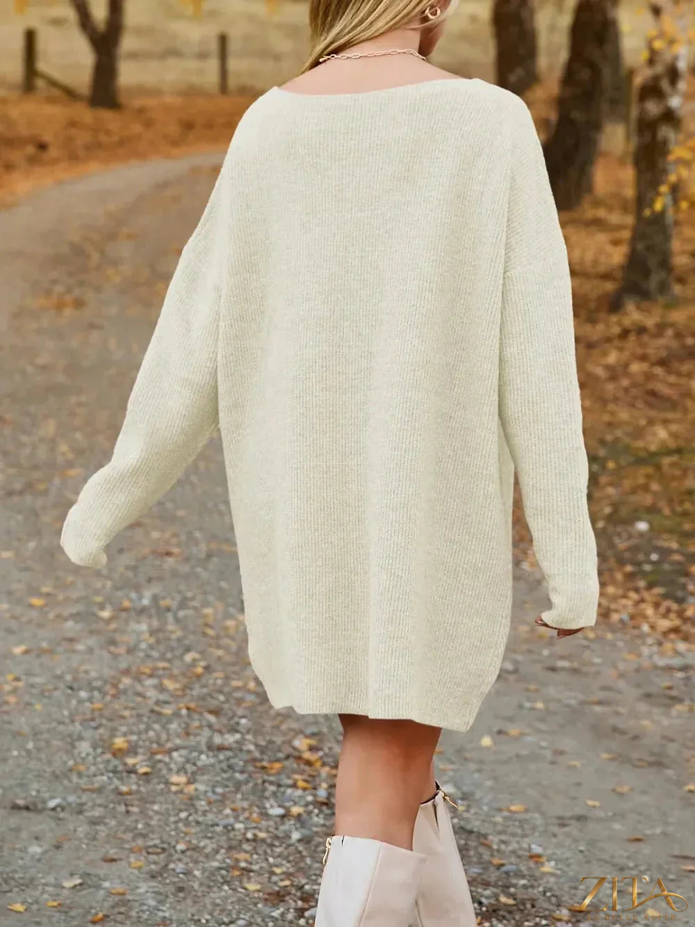 Zita La Belle Elite V-neck dropped shoulder sweater dress, cozy knit, soft fabric, styled with a relaxed fit for casual elegance.