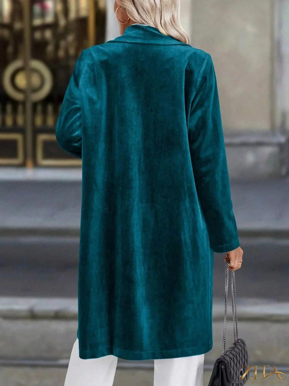 Zita La Belle Elite longline coat with lapel collar, long sleeves, and a stylish, tailored design in a neutral color.