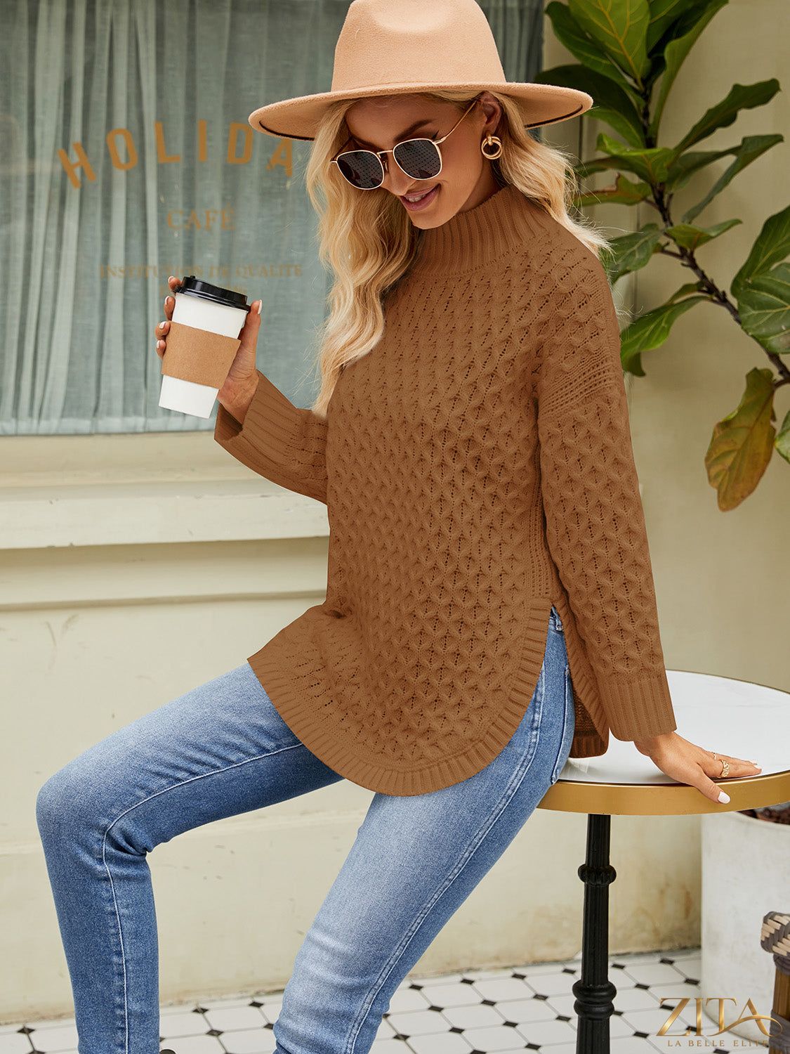 Zita La Belle Elite mock neck slit sweater featuring a ribbed knit texture and a stylish slit detail at the side.