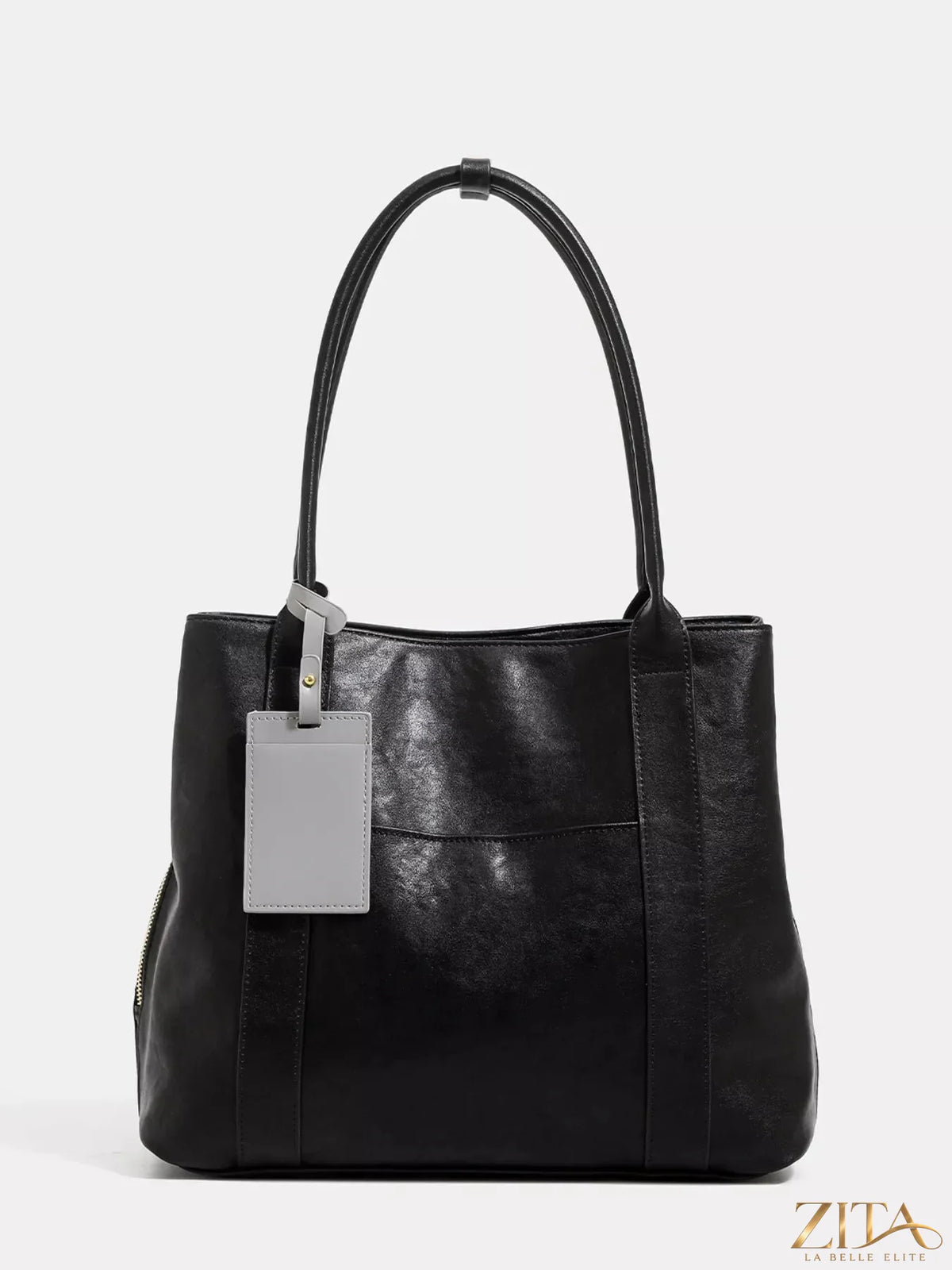 Trendsi PU leather tote bag with double handles and spacious interior, ideal for everyday carry and stylish organization.