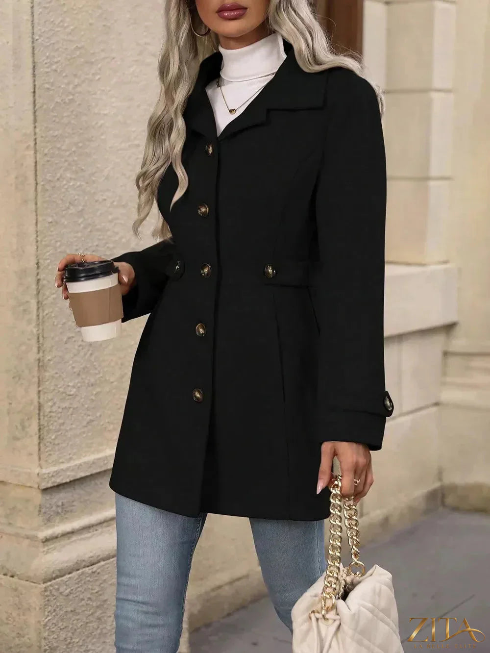 Zita La Belle Elite collared neck button-up coat displayed on a hanger, featuring a tailored design and classic button details.