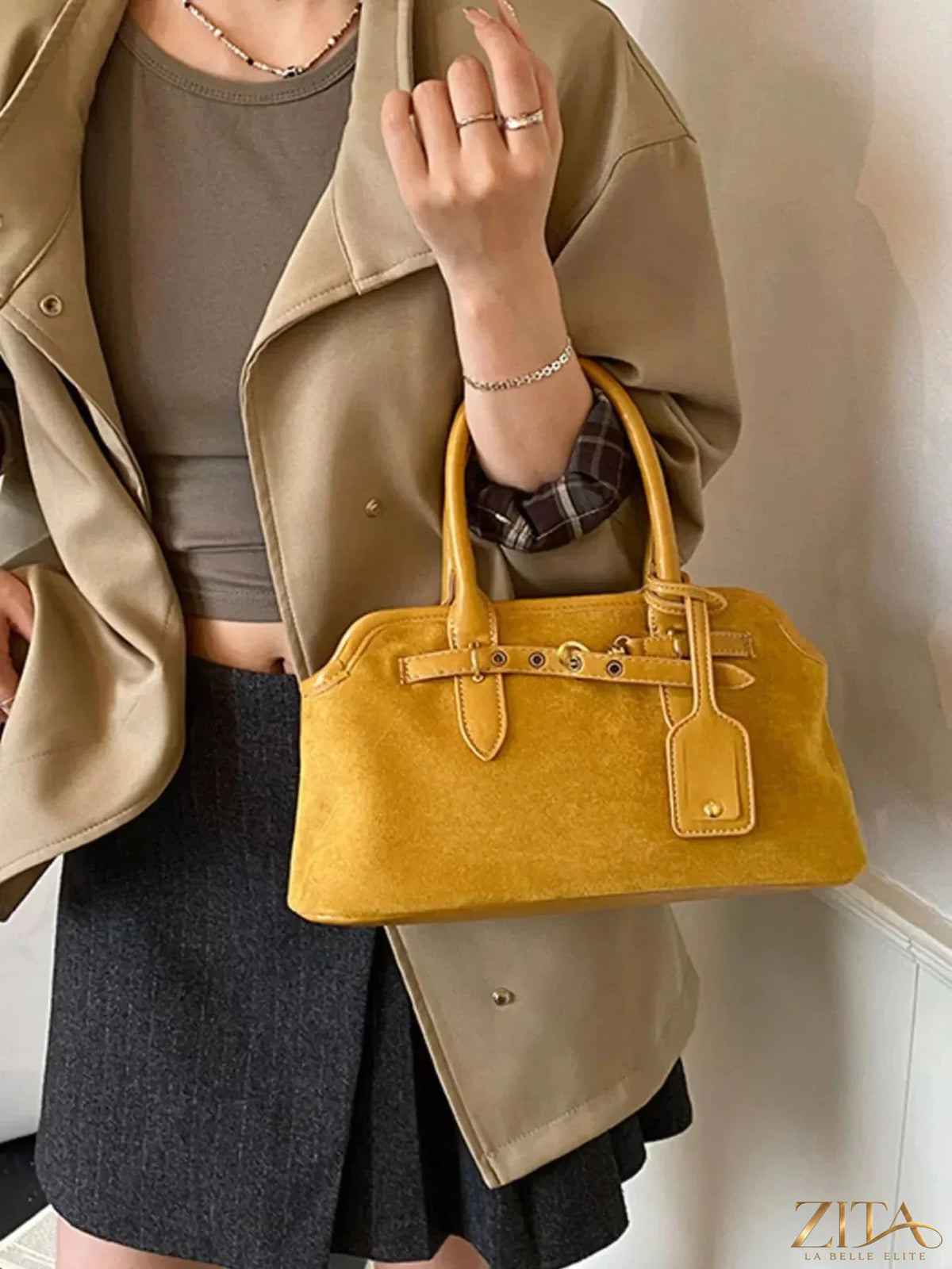 Vintage Zita La Belle Elite handbag with buckle detail, featuring a classic leather design and elegant hardware.