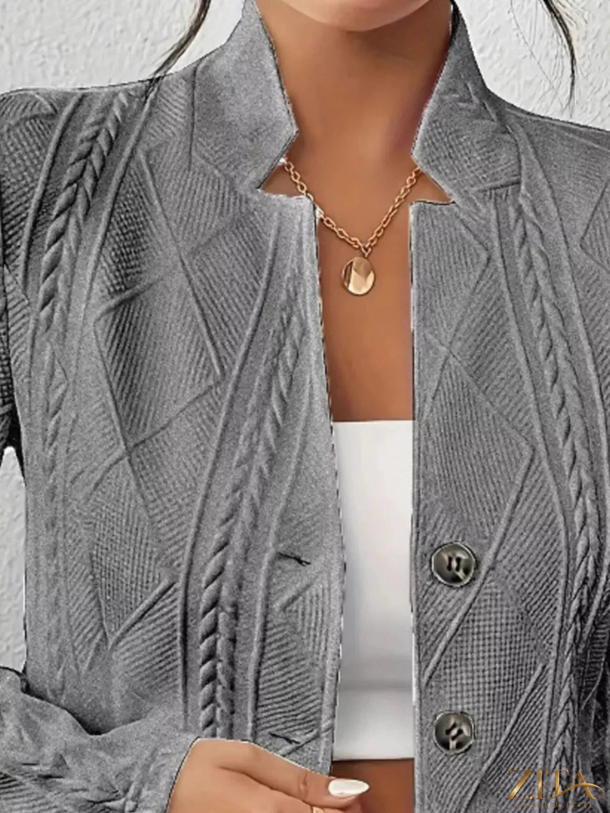 Textured knit button-front blazer by Zita La Belle Elite, showing the tailored fit and detailed fabric in a neutral color.