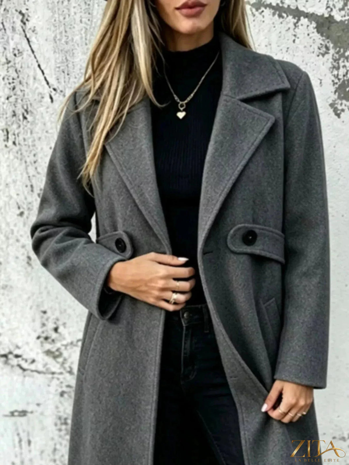 Plus size Zita La Belle Elite full-size lapel collar longline overcoat hanging on a clothing rack.