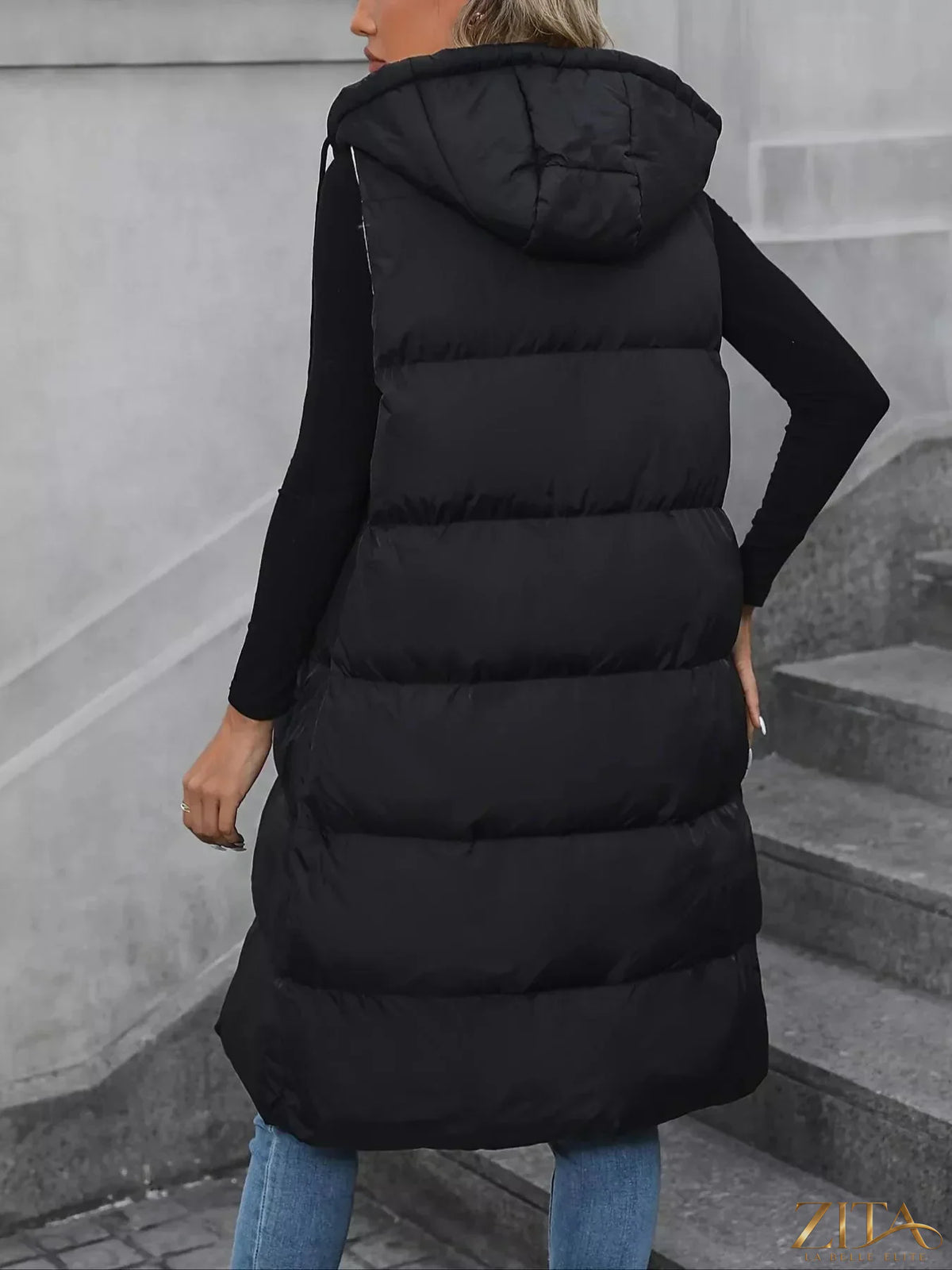Zita La Belle Elite longline padded hooded vest coat with quilted design and front pockets, ideal for cold weather layering.