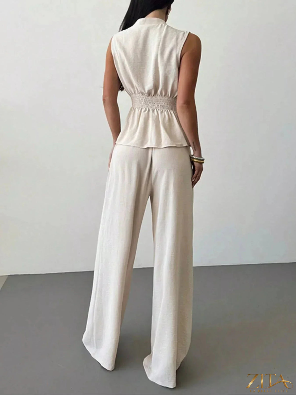 Zita La Belle Elite sleeveless top and wide-leg pants set, featuring a stylish sleeveless blouse with flowy wide-leg trousers.