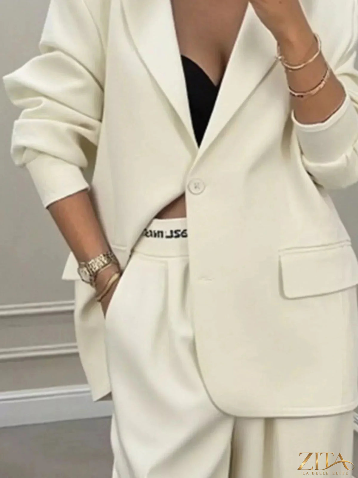 Plus size Zita La Belle Elite blazer and wide-leg pants set, featuring a full-size one-button blazer and matching trousers.