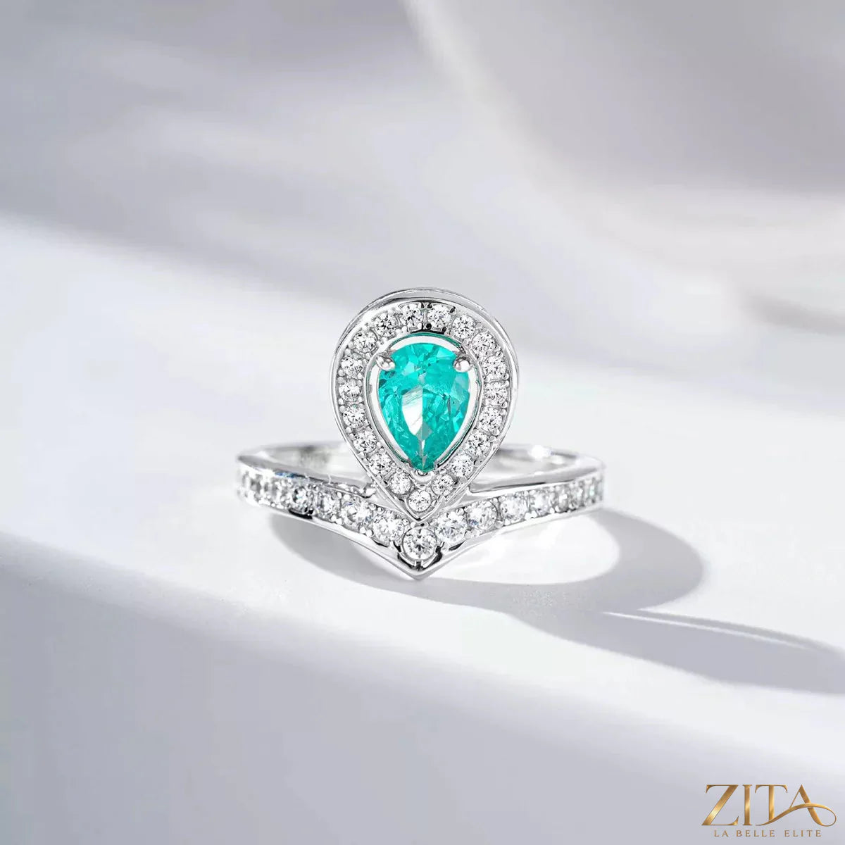 925 sterling silver zircon teardrop ring with a sleek design, featuring sparkling stones and a polished band.