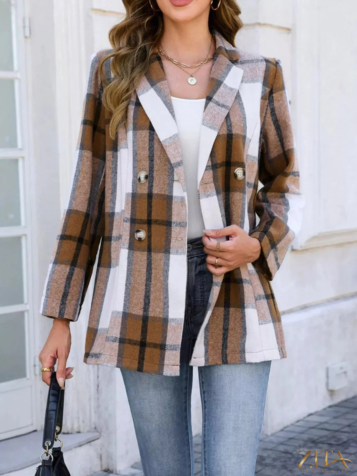 Plaid double-breasted blazer by Trendsi featuring a classic pattern, tailored fit, and stylish lapels, displayed on a mannequin.