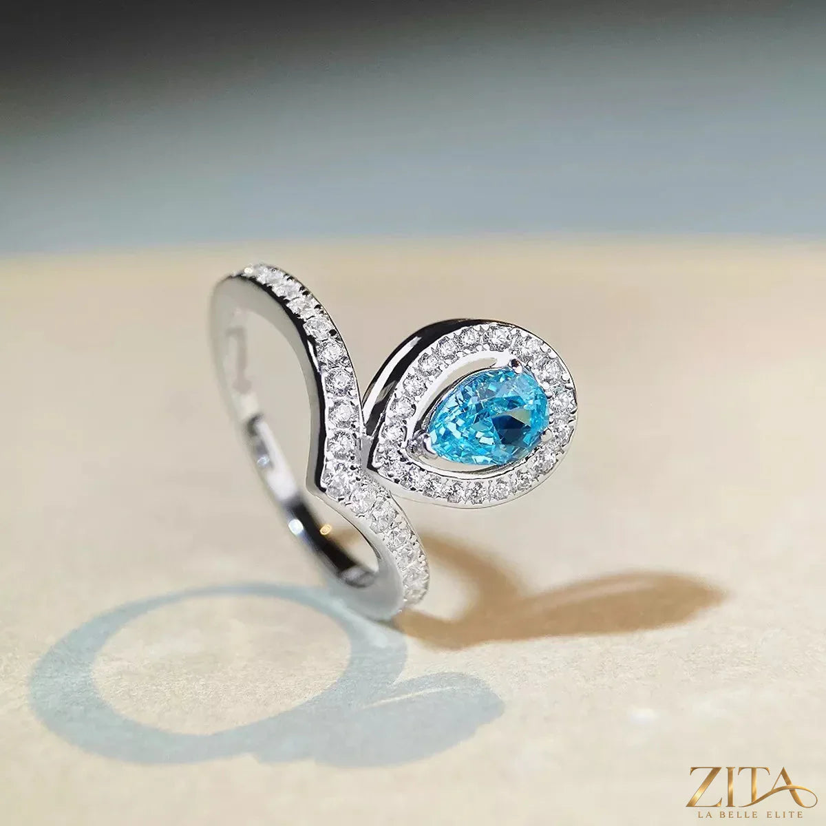 925 sterling silver zircon teardrop ring with a sleek design, featuring sparkling zircon stones and a polished silver band.