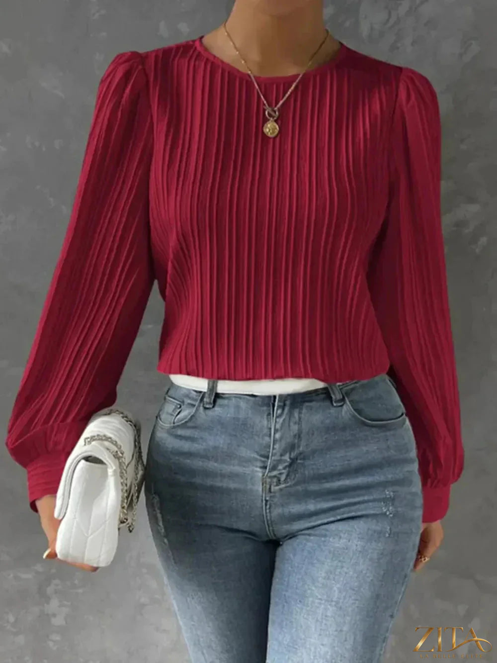 Zita La Belle Elite round neck long sleeve blouse in soft fabric, shown on a hanger with a neutral background.