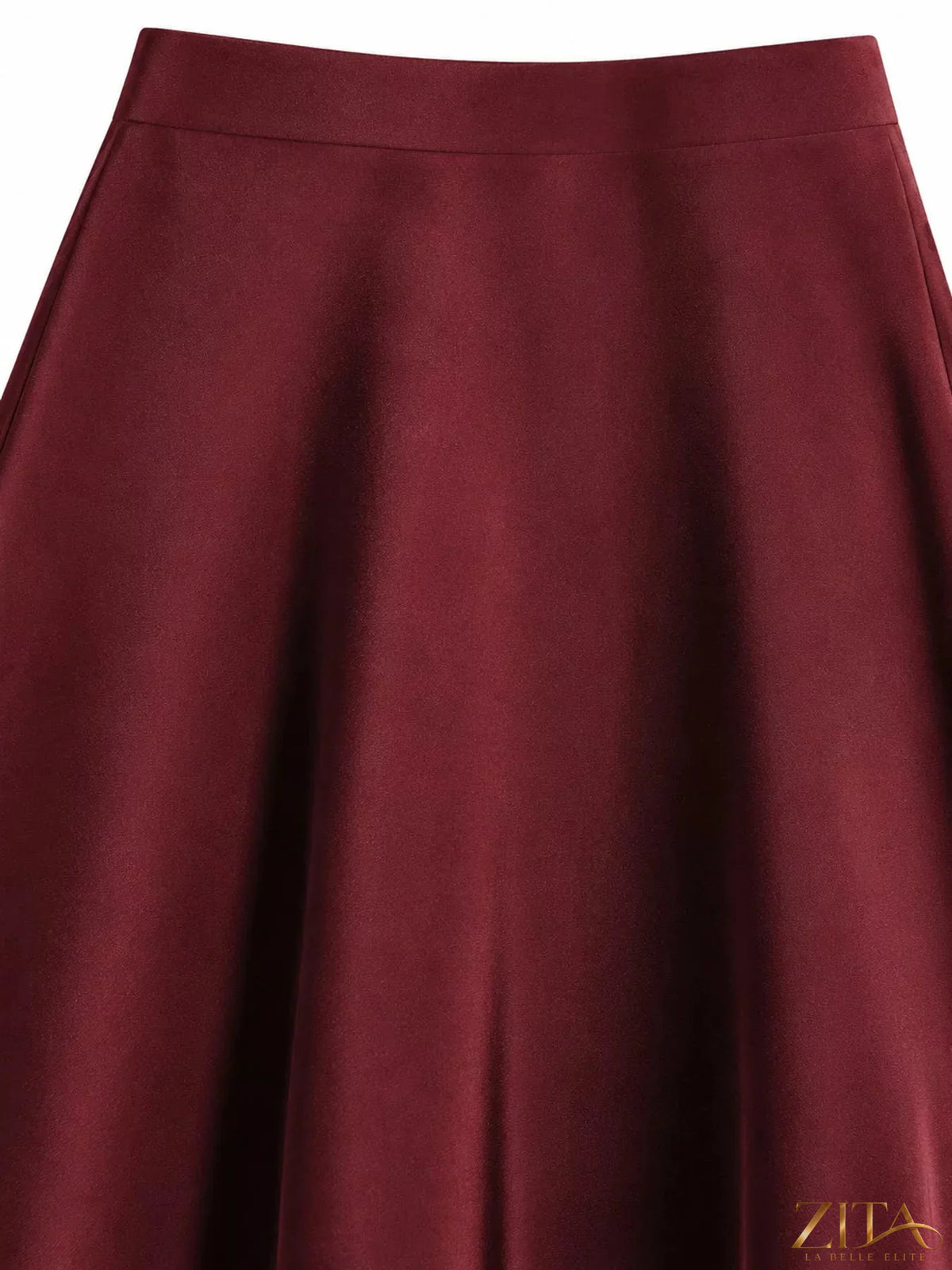 Full size high-waisted satin midi skirt in plus size, featuring a smooth, shiny fabric and flowing silhouette.