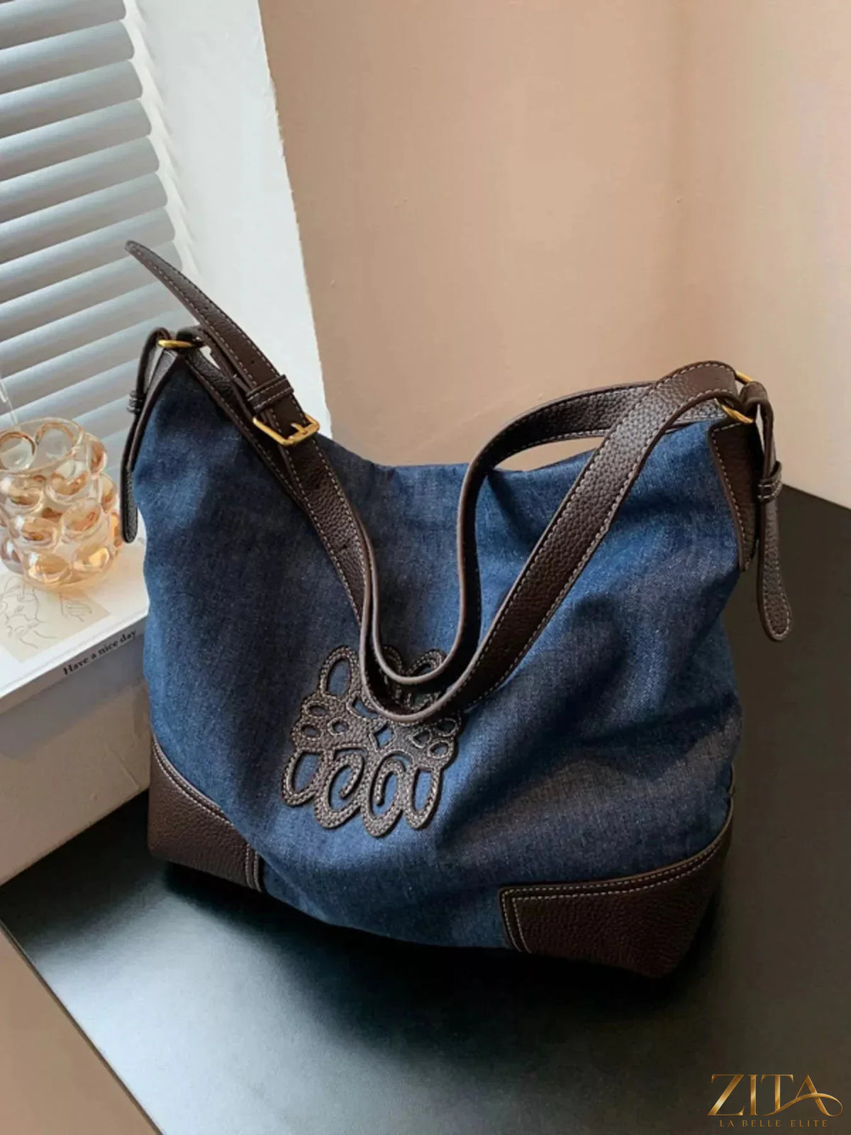 Embroidered canvas tote bag by Zita La Belle Elite with colorful floral embroidery and sturdy handles for everyday use.