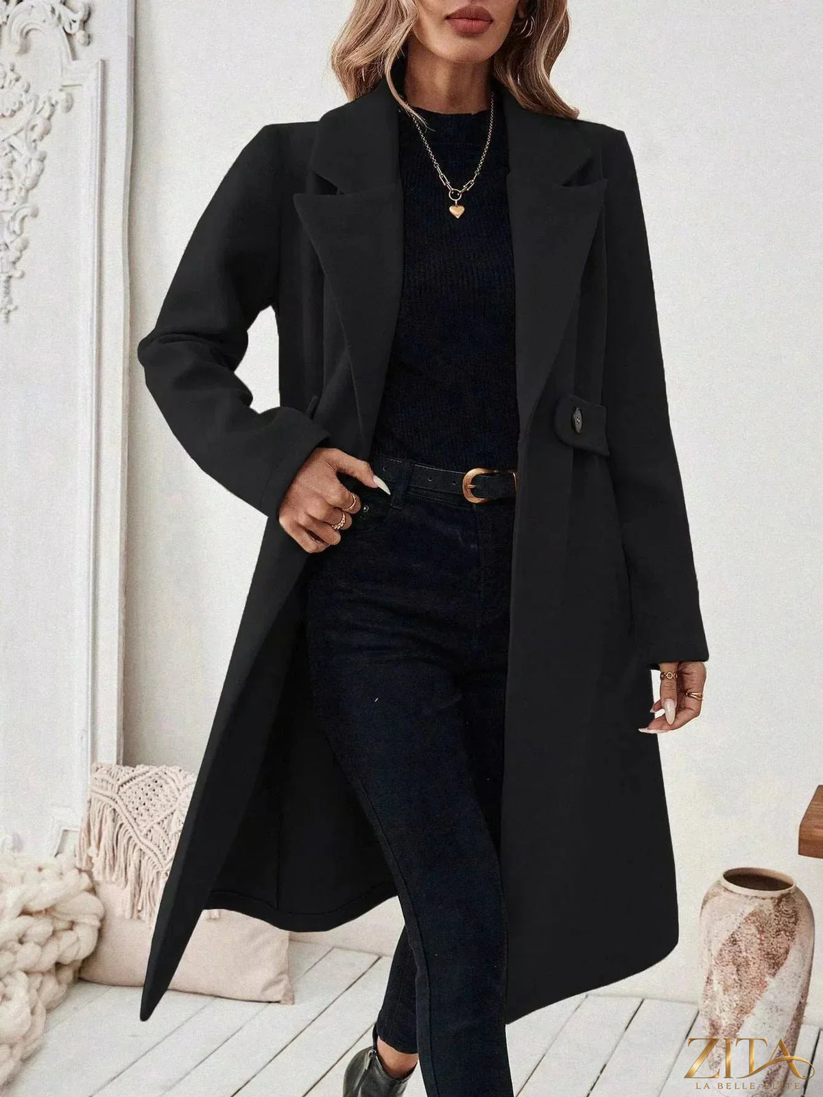 Zita La Belle Elite single-button longline coat in neutral fabric, displayed on a hanger with a minimalist background.
