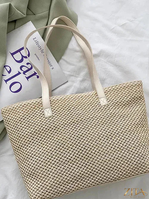 Solid color woven tote bag by Zita La Belle Elite with sturdy handles, perfect for everyday carrying and stylish accessories.