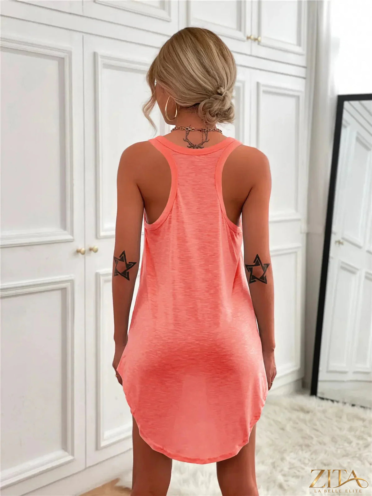 Zita La Belle Elite casual tank mini dress with curved hem, sleeveless design, and lightweight fabric for a relaxed summer look.