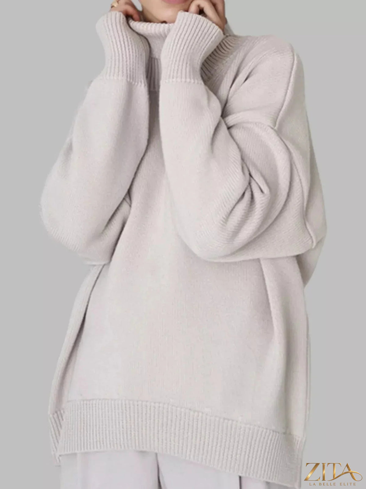 Zita La Belle Elite turtleneck dropped shoulder sweater in soft knit fabric, showcasing its cozy, relaxed fit and stylish design.