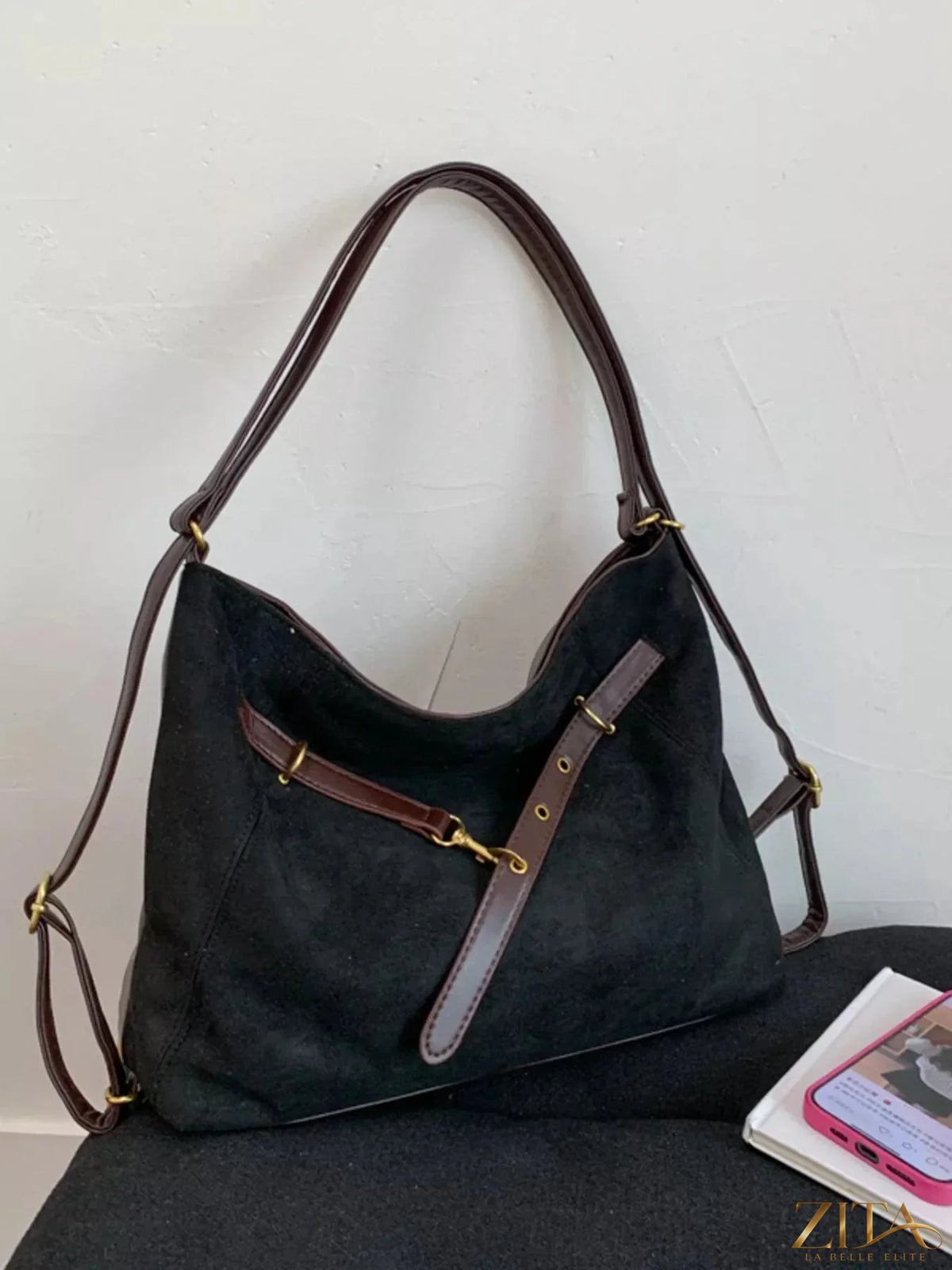 Zita La Belle Elite adjustable strap handbag with decorative charm, featuring a sleek design and versatile carry options.