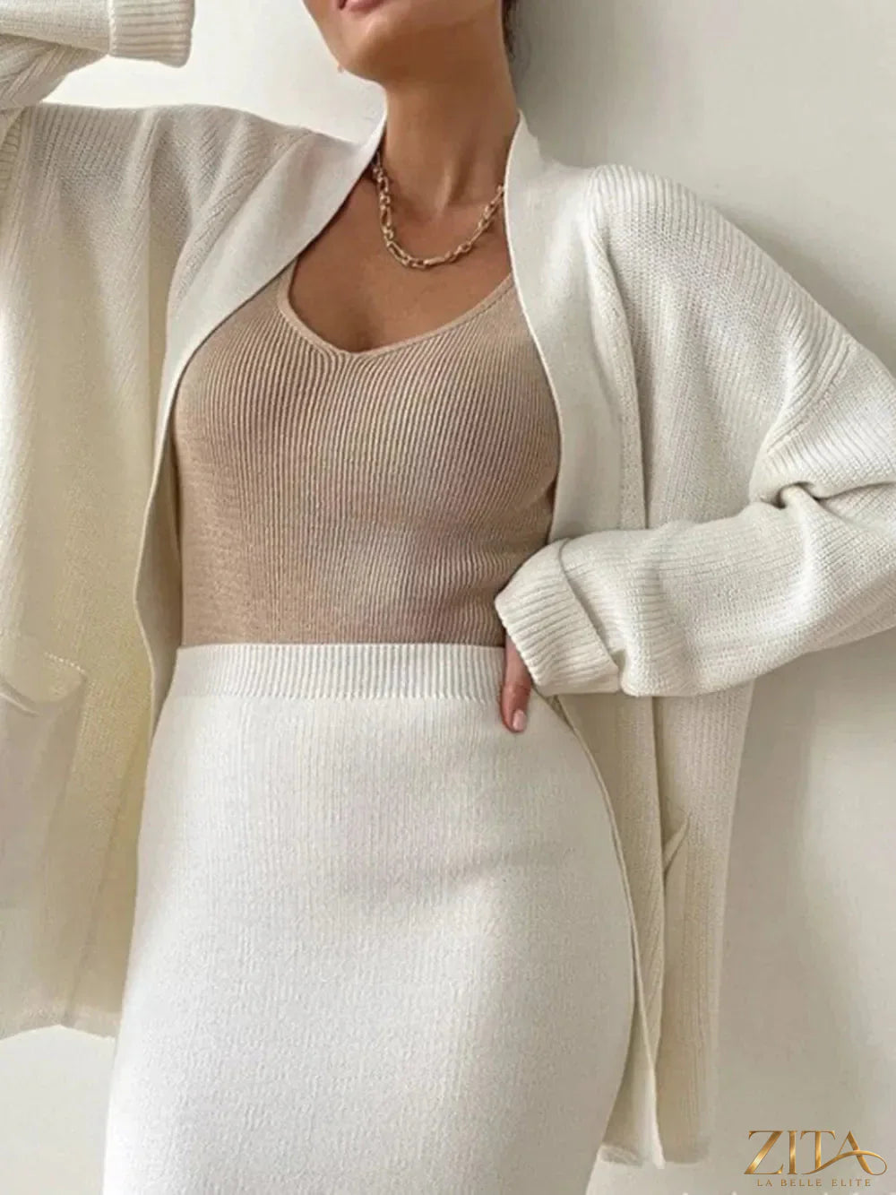Zita La Belle Elite pocketed long sleeve cardigan and skirt sweater set, featuring soft knit fabric and classic design, front view.