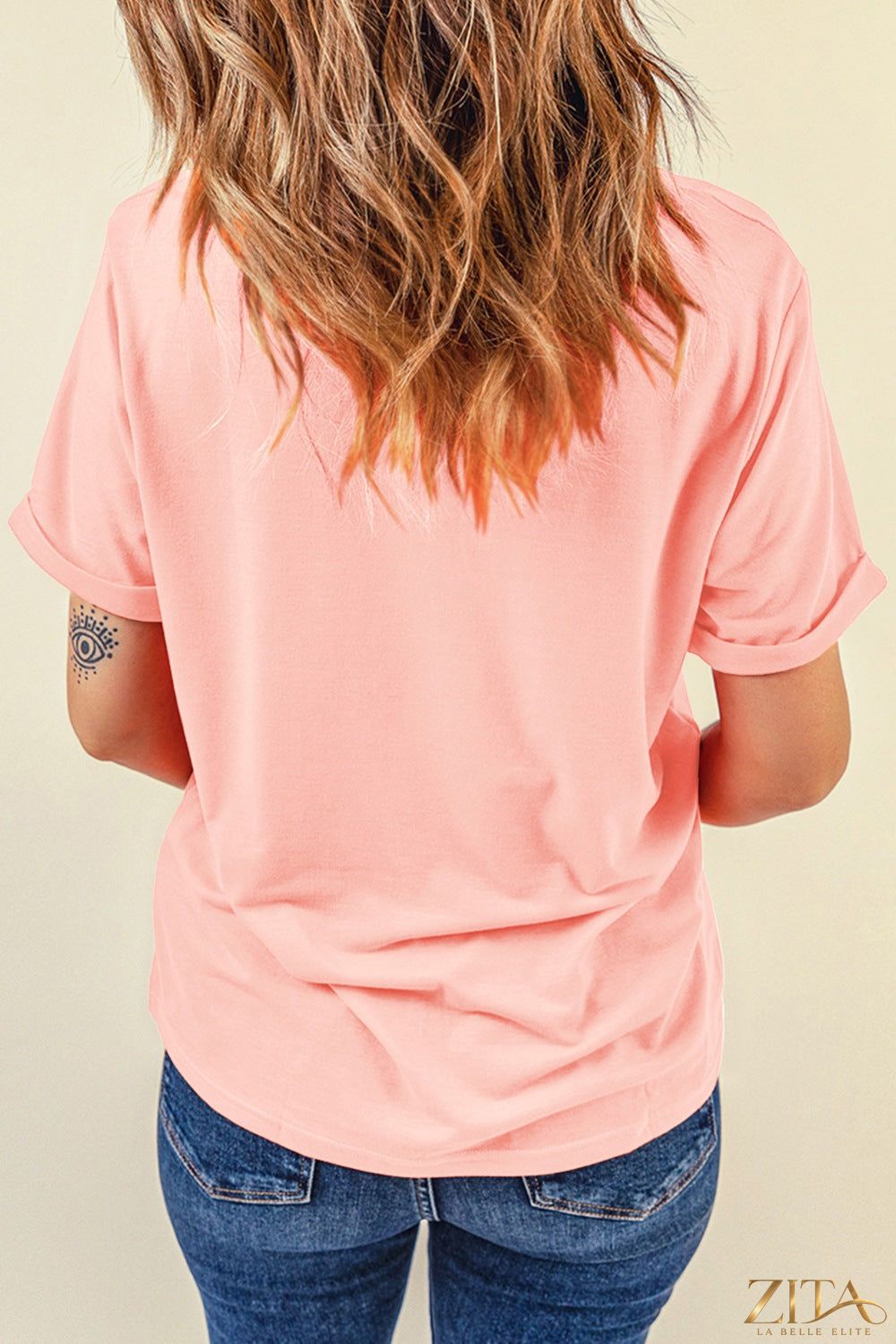 Red and white patriotic heart round neck T-shirt by Trendsi featuring a bold heart graphic on soft fabric.