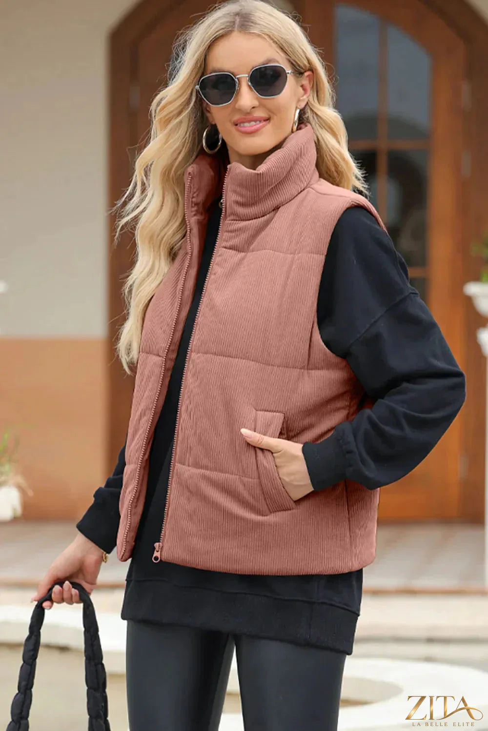 Trendsi pocketed zip-up turtleneck vest coat with front pockets and a fitted design, shown in a neutral color.