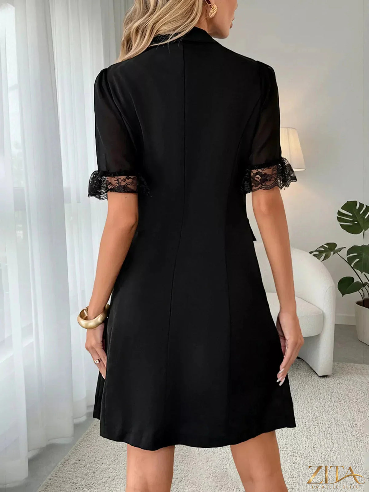 Zita La Belle Elite lace detail double-breasted blazer dress featuring tailored fit and classic lapels on a model.