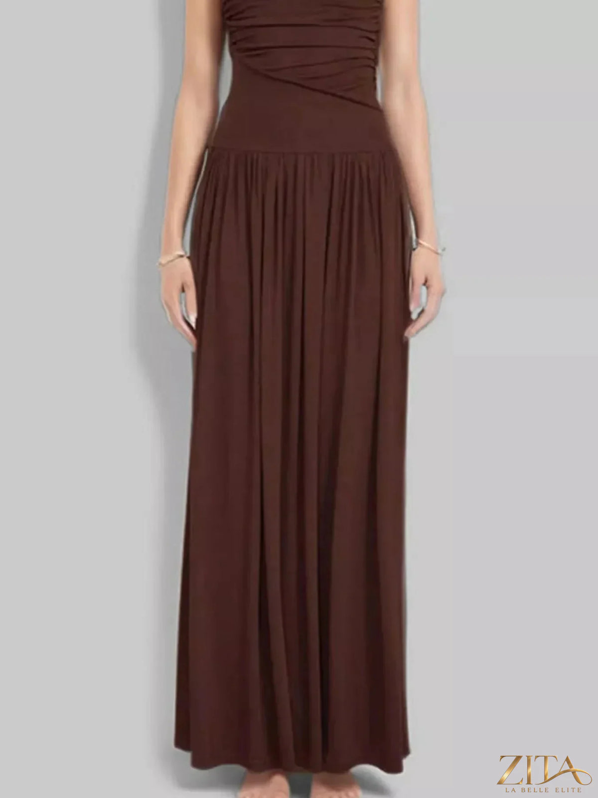 Zita La Belle Elite ruched sleeveless maxi dress in flowing fabric, elegant design with fitted bodice and wide straps.