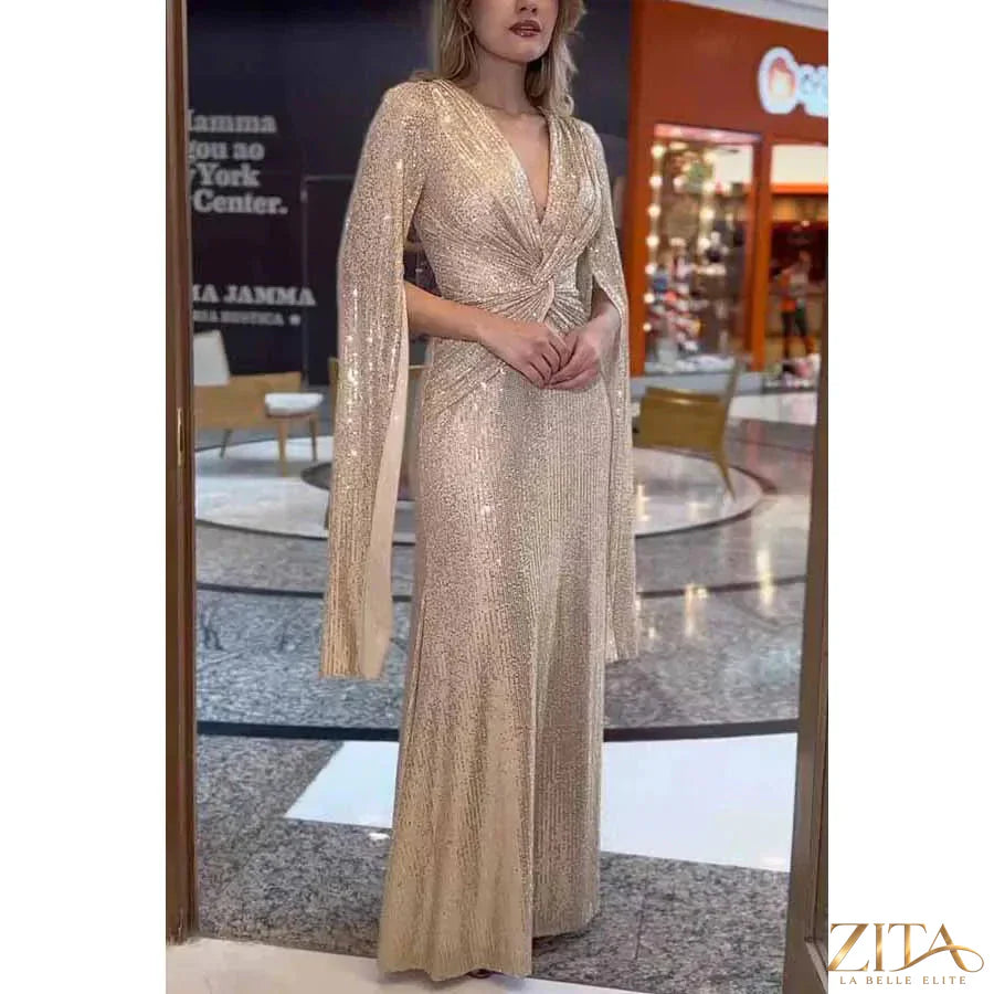Elegant women’s evening dress by Zita La Belle Elite featuring shimmering sequin details and a floor-length formal design.