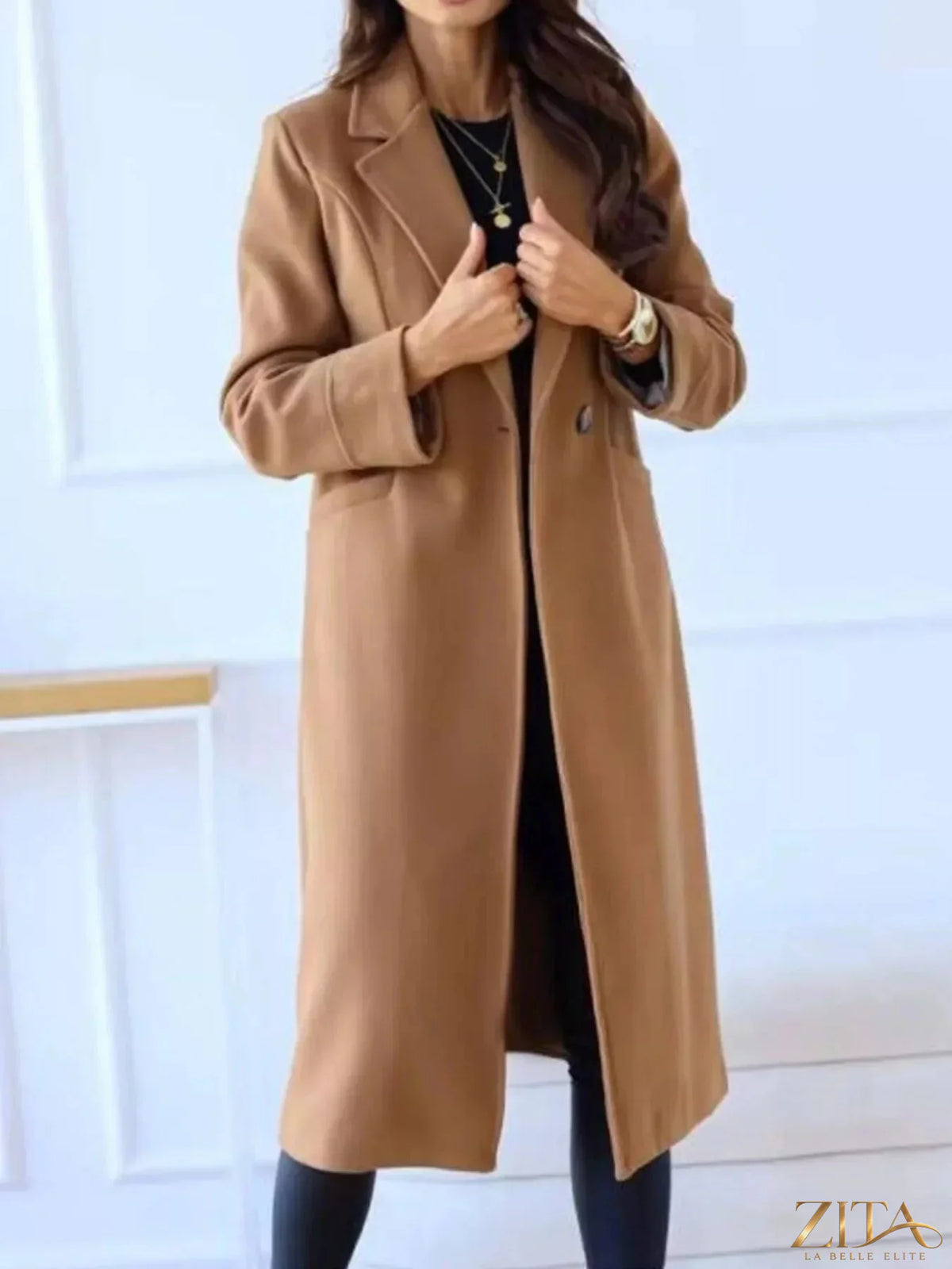Zita La Belle Elite wool blend overcoat with lapel collar, tailored fit, in a classic neutral color, displayed on a hanger.