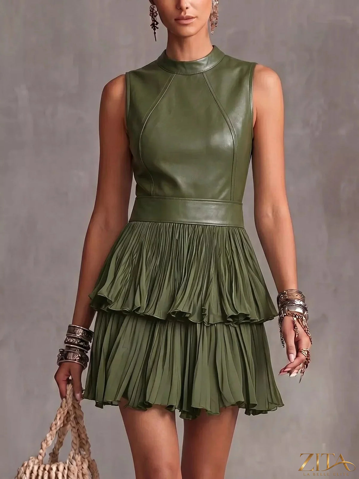 Zita La Belle Elite sleeveless faux leather layered pleated mini dress, black with a fitted silhouette and stylish design.