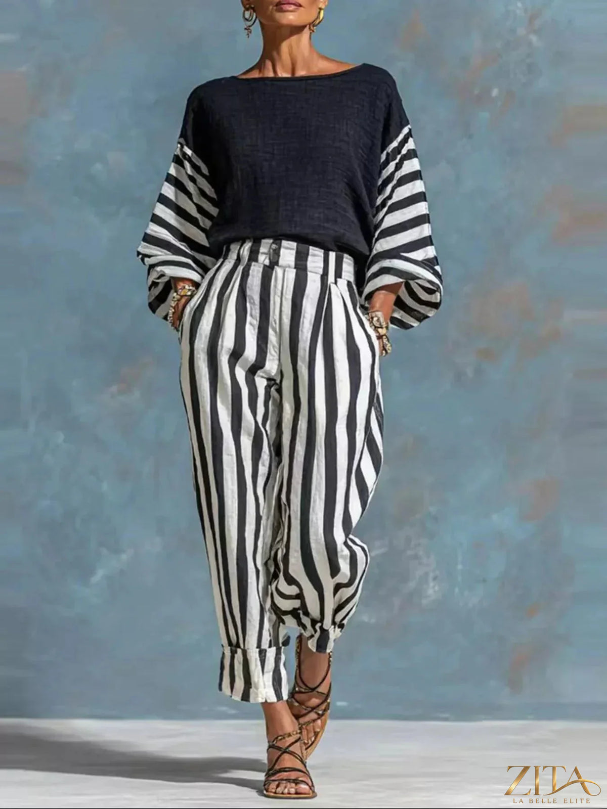 Striped long sleeve top and pants set by Zita La Belle Elite, featuring a coordinated casual outfit for women.
